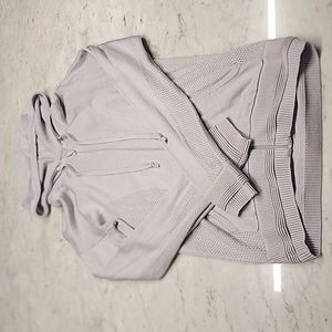 Great condition size 4 Lululemon light grey hooded zip up sweater